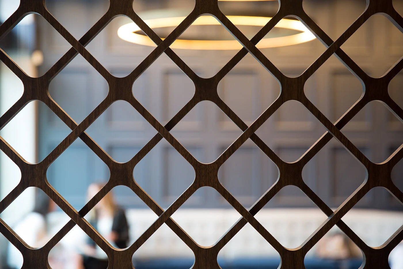 Arnold + Egan project photo, custom walnut diamond-lattice screen